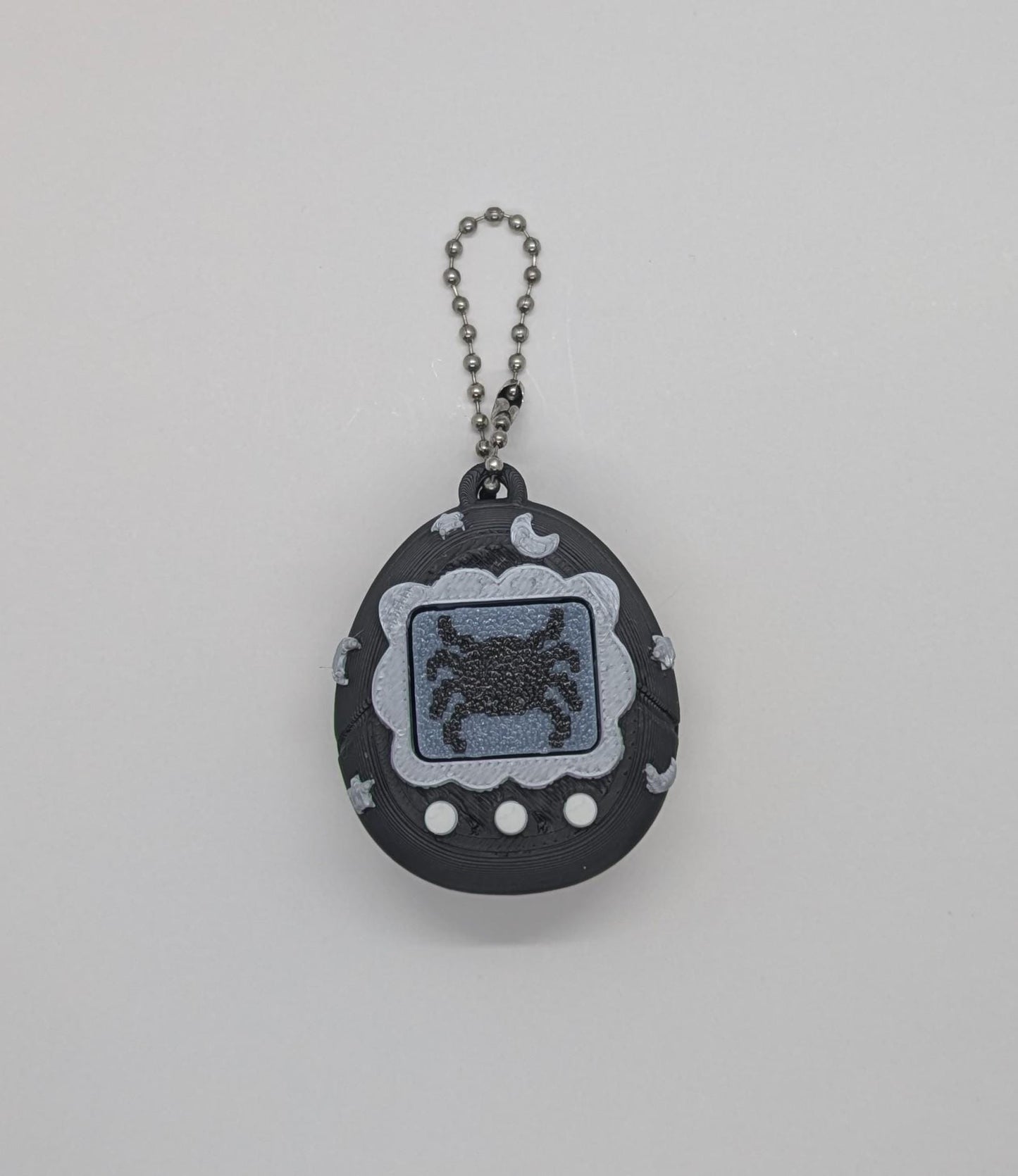 Black Tamagotchi Style Clicker Fidget with Silver Stars – Pet Face