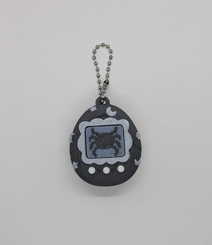 Black Tamagotchi Style Clicker Fidget with Silver Stars – Pet Face