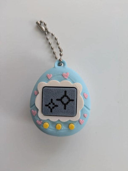Blue Tamagotchi Style Clicker Fidget with Pink Hearts