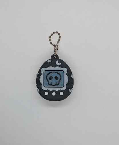 Black Tamagotchi Style Clicker Fidget with Silver Stars – Pet Face
