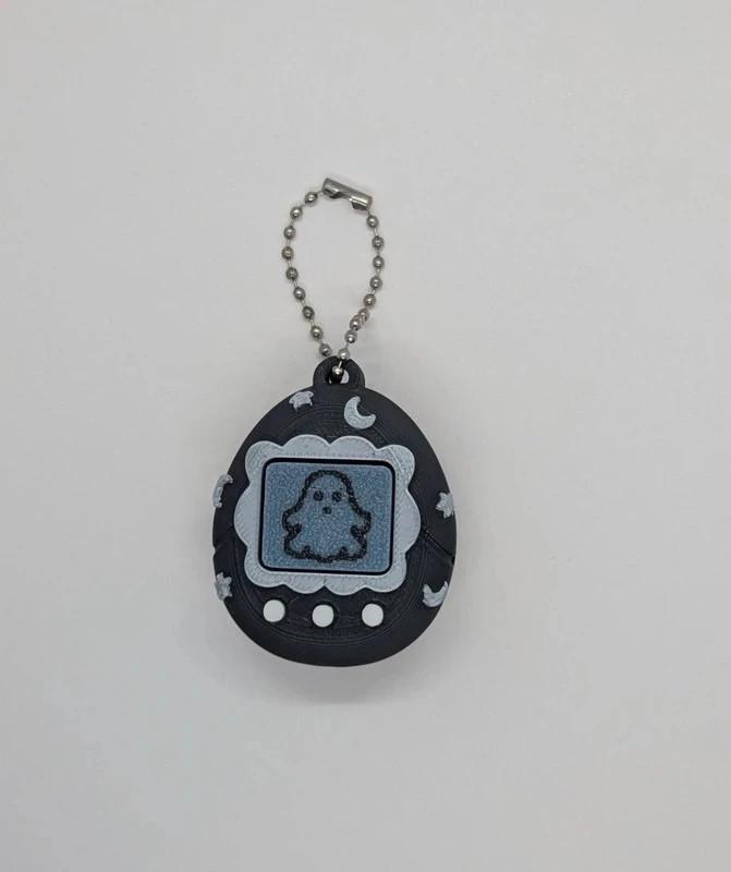 Black Tamagotchi Style Clicker Fidget with Silver Stars – Pet Face