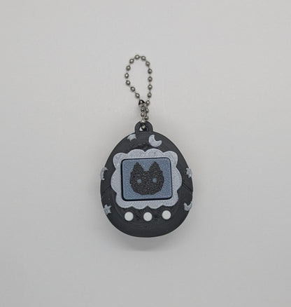 Black Tamagotchi Style Clicker Fidget with Silver Stars – Pet Face