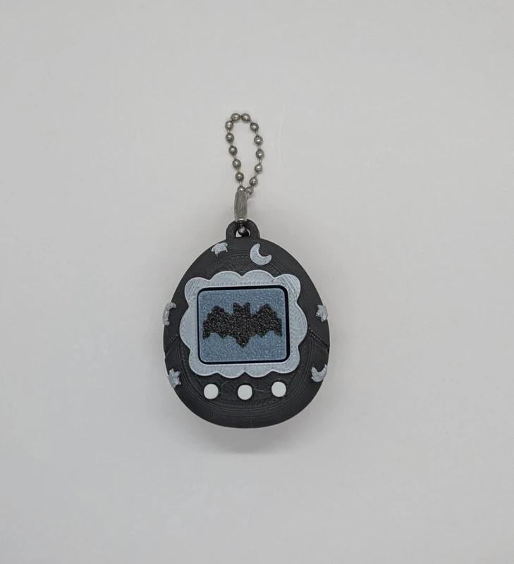 Black Tamagotchi Style Clicker Fidget with Silver Stars – Pet Face
